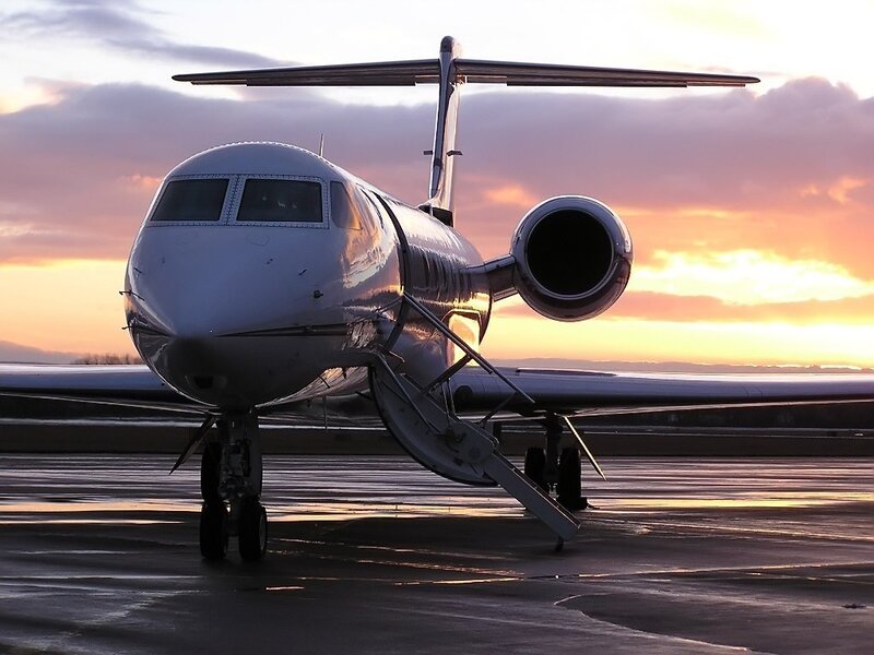 Private Jet on Tarmac — Orange, Dramatic