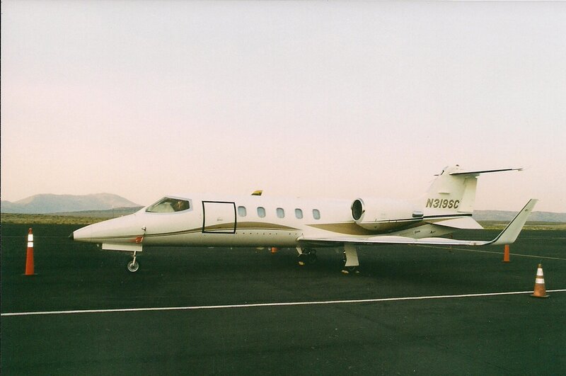 Private Jet on Tarmac — White, Calm, Sunset