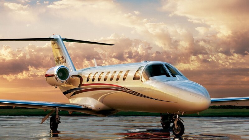 private jet on wet tarmac