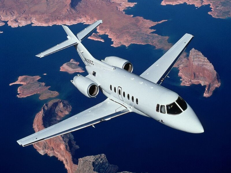 private jet over lake