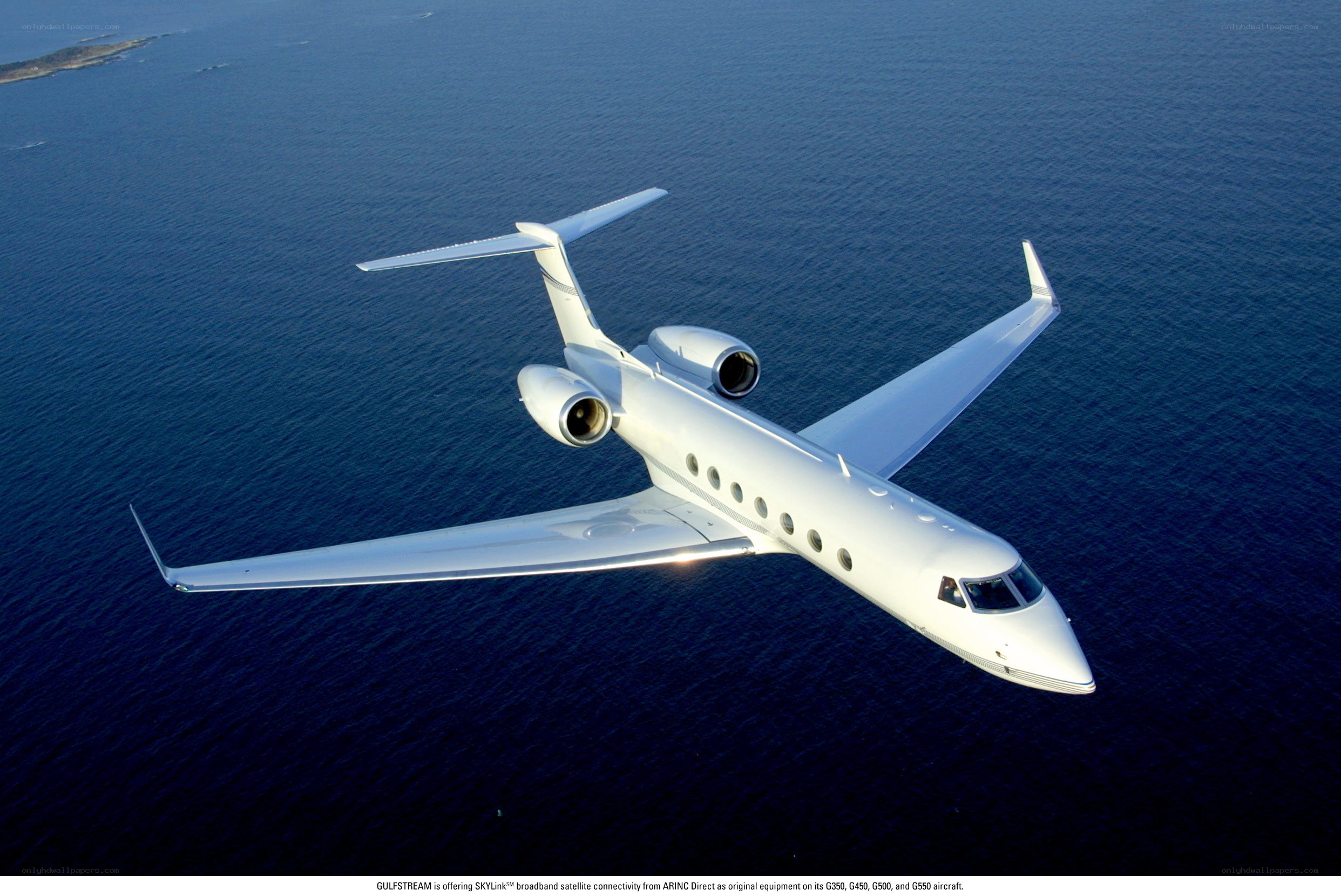 private jet over ocean