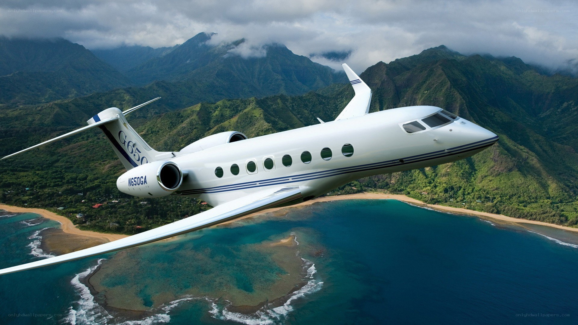 Private jet over tropical island