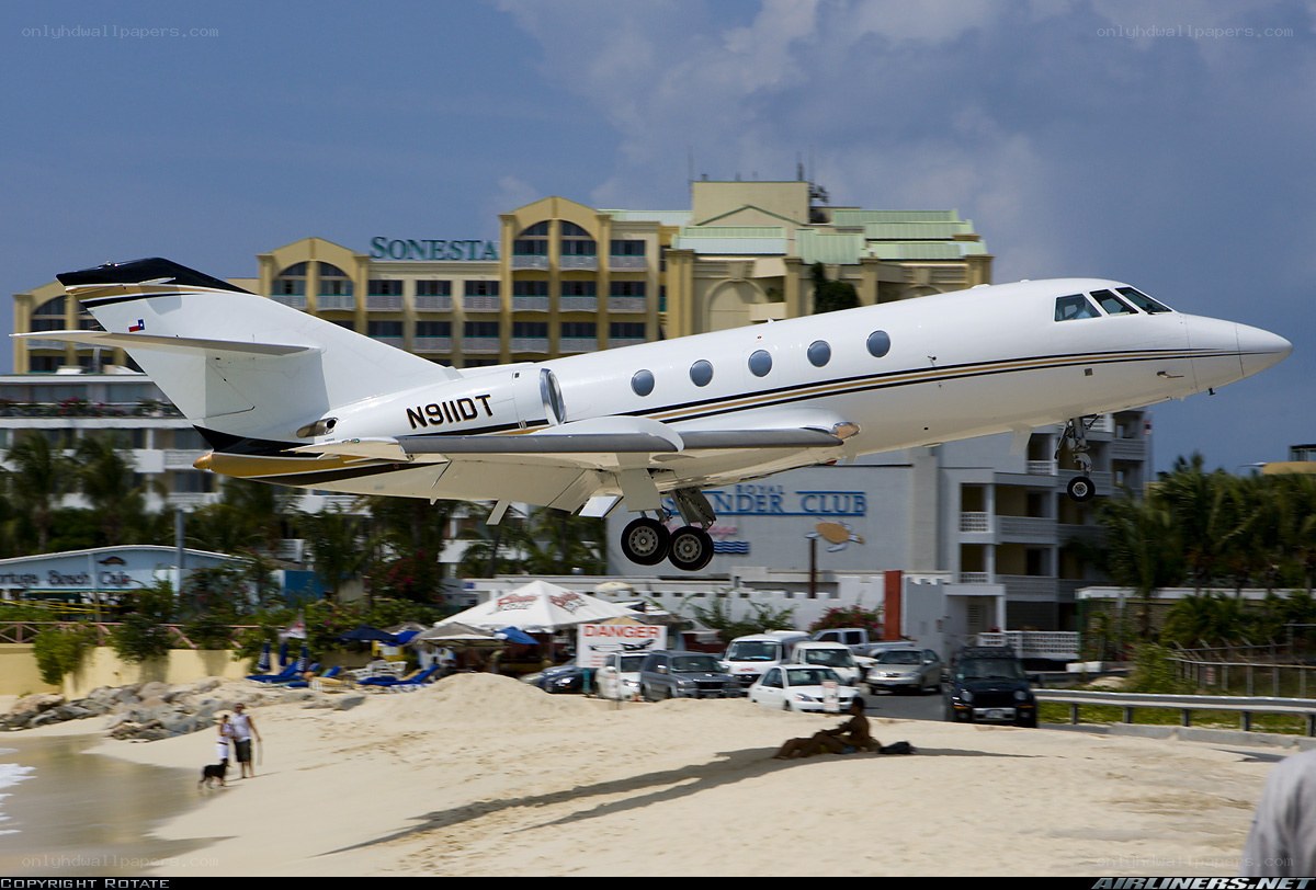 private jet taking off from beach