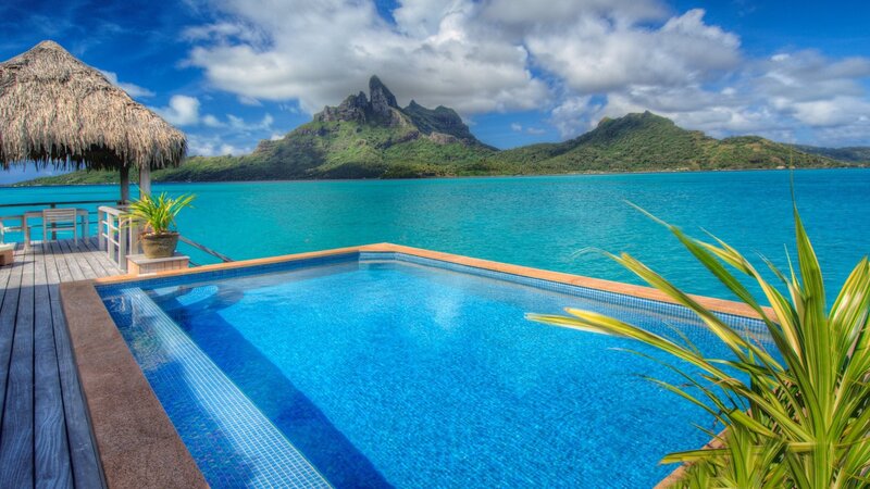 Private Pool with Ocean View — Blue, Serene, Afternoon, Photograph, Thatched Roof