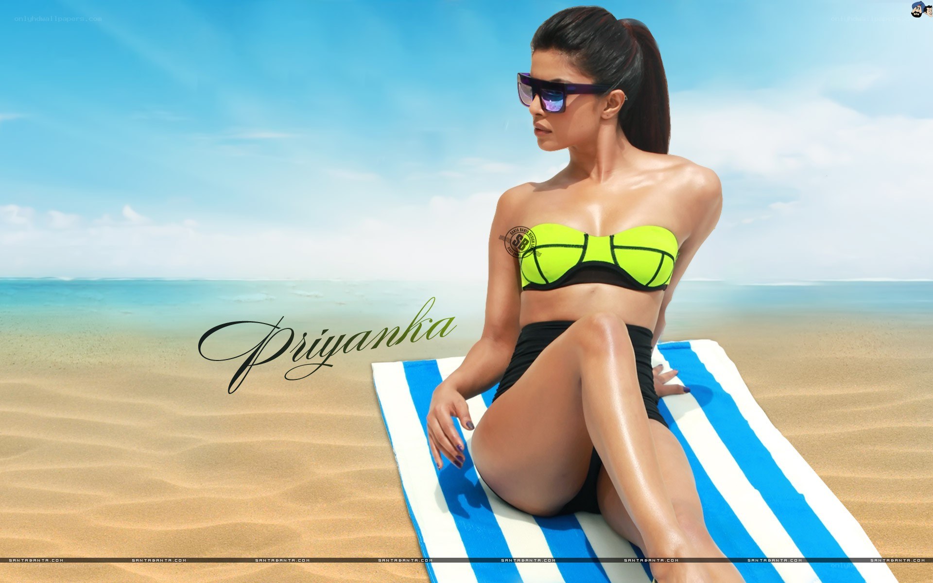 Priyanka on a beach towel