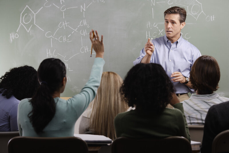 Professor teaching chemistry class