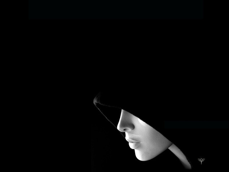Profile of a person in shadow