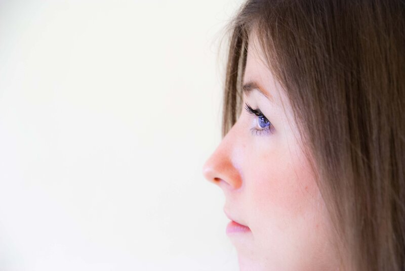 profile of a woman with blue eyes