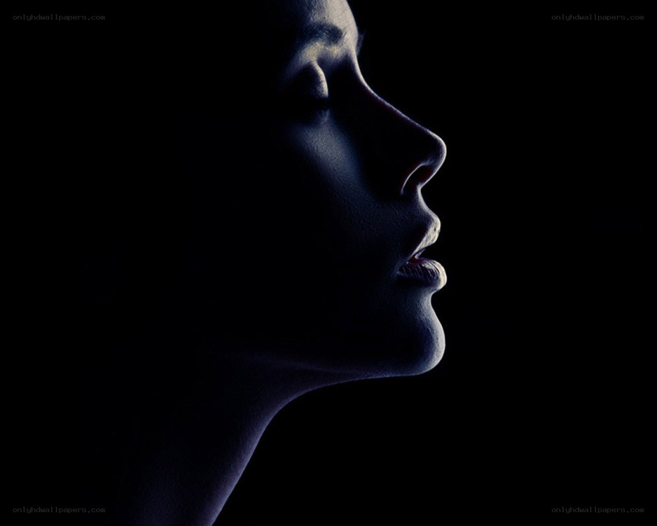 profile silhouette in blue light