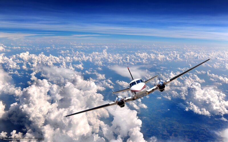 Propeller Airplane — Blue, Serene, Photograph, Clouds