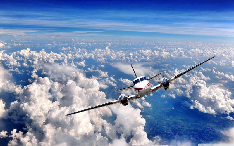 Propeller Airplane Flying — Blue, Serene, Afternoon