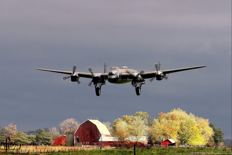 Propeller Airplane Flying — Gray