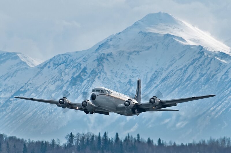 Propeller Airplane Flying — White