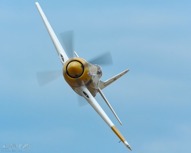 Propeller Airplane in Flight — Blue, Dynamic, Afternoon, Photograph, Sky