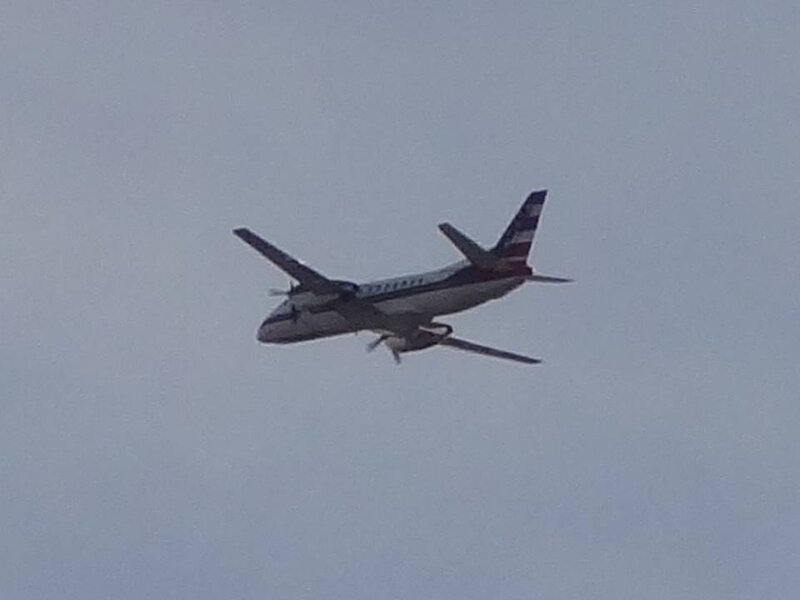Propeller Airplane in Flight — Gray, Neutral