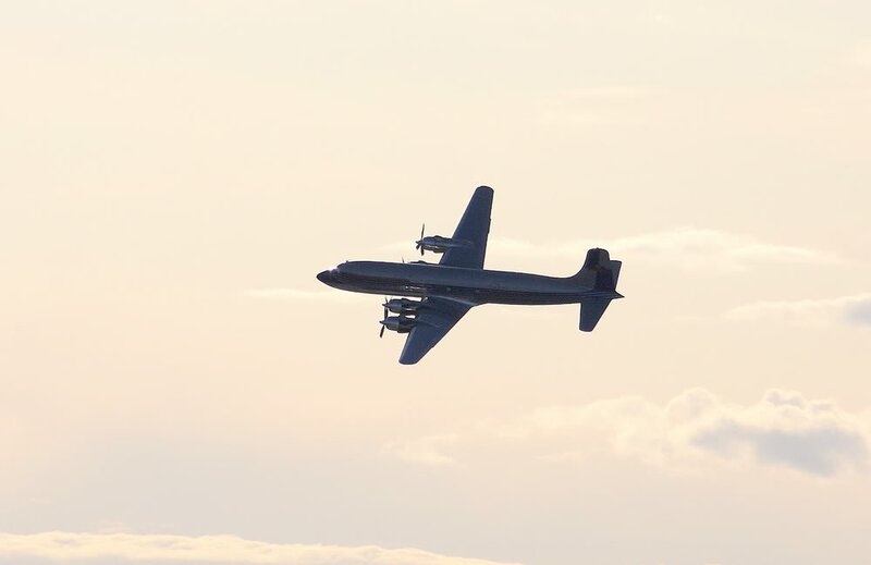Propeller Airplane in Flight — Gray, Serene