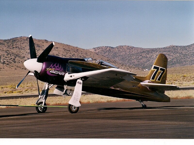 Propeller Airplane on Runway — Brown