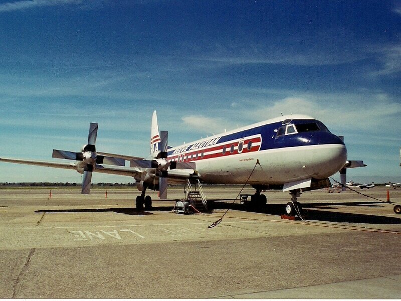 Propeller Airplane on Tarmac — Blue, Calm