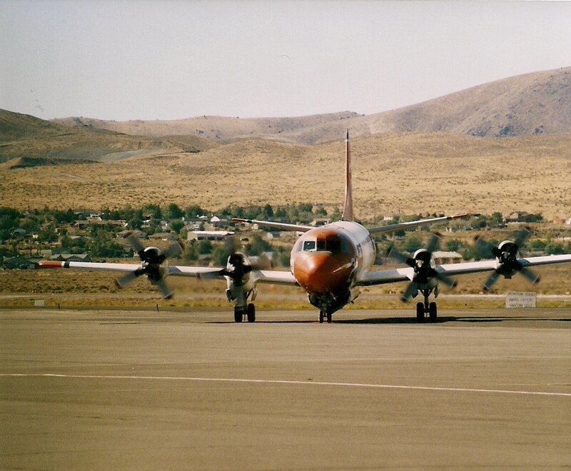 Propeller Airplane on Tarmac — Brown