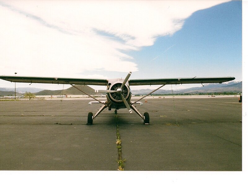 Propeller Airplane on Tarmac — Gray, Calm, Afternoon, Photograph