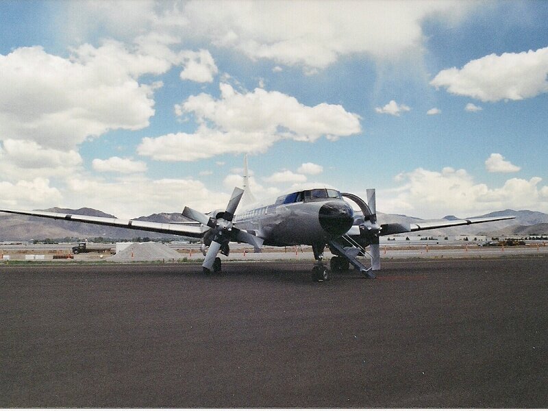 Propeller Airplane on Tarmac — Gray, Calm, Afternoon