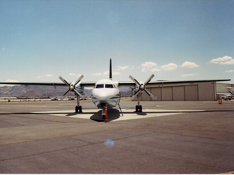 Propeller Airplane on Tarmac — Gray, Calm