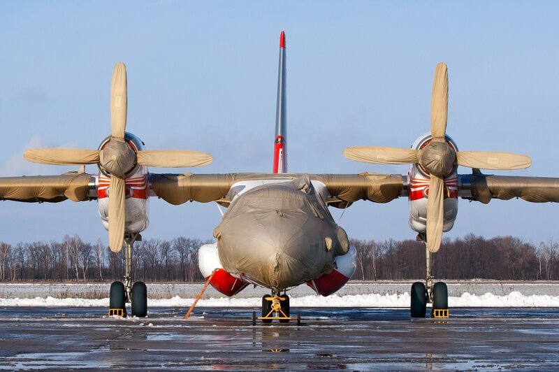 Propeller Airplane on Tarmac — Gray, Cold