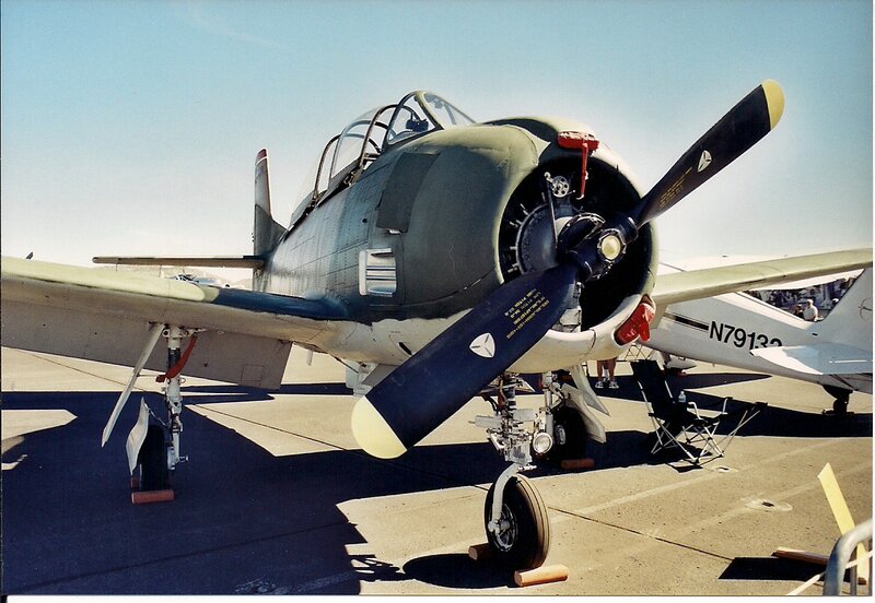 Propeller Airplane on Tarmac — Gray, Neutral, Afternoon