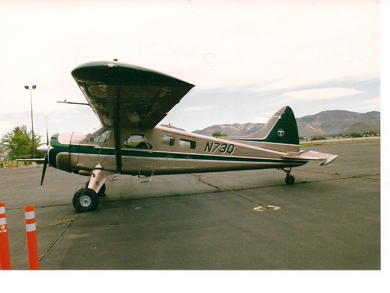 Propeller Airplane on Tarmac — Green, Calm