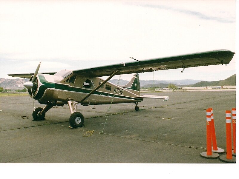 Propeller Airplane on Tarmac — Green