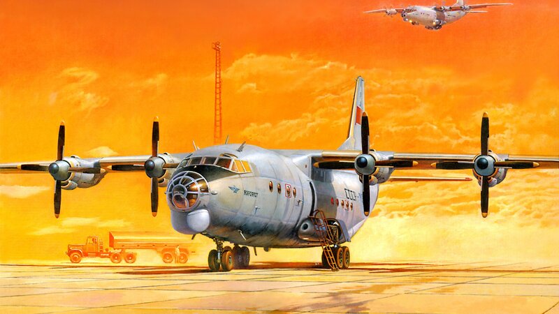 Propeller Airplane on Tarmac — Orange