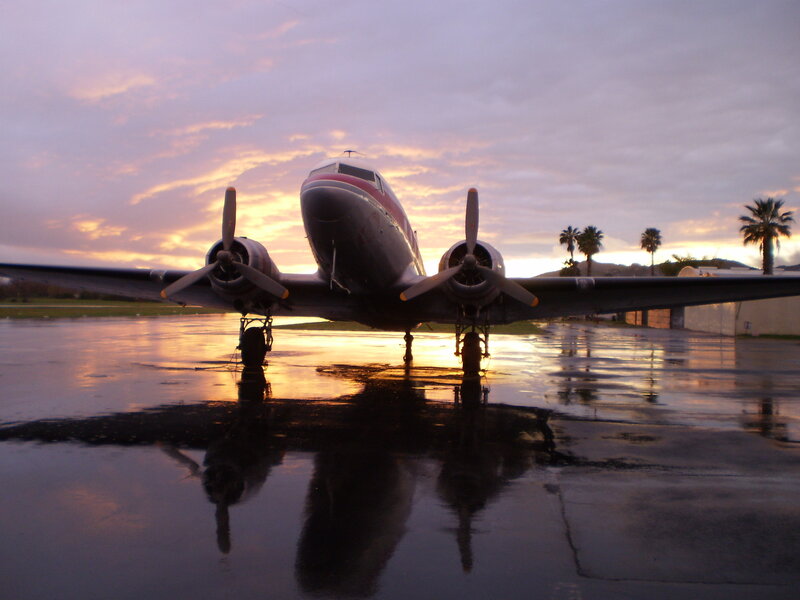 Propeller Airplane on Tarmac — Purple