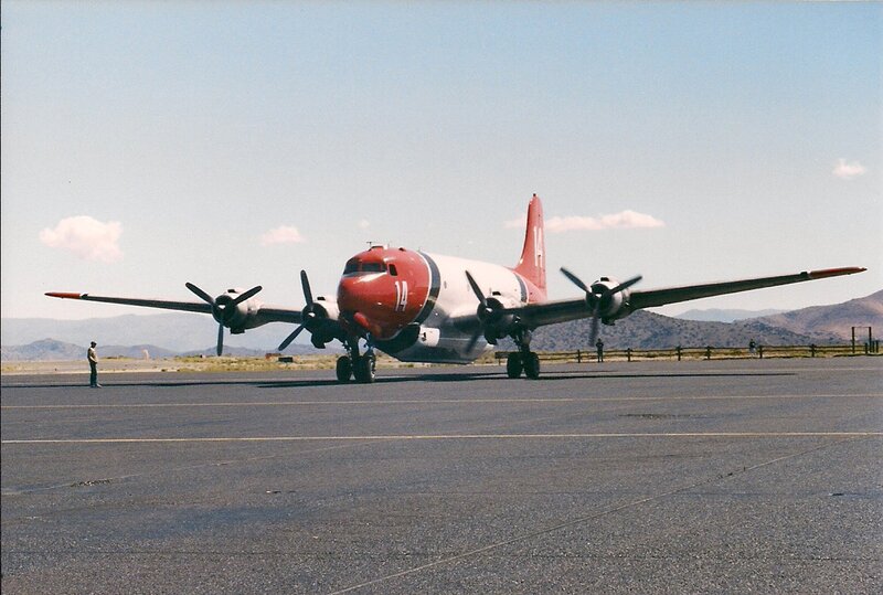 Propeller Airplane on Tarmac — Red