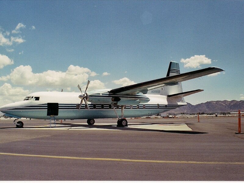 Propeller Airplane on Tarmac — White, Calm