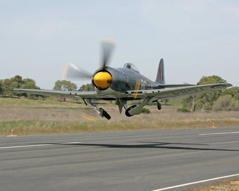 Propeller Airplane Taking Off