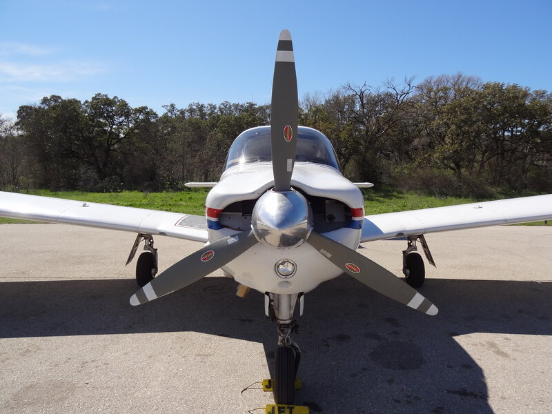Propeller Airplane — White, Calm
