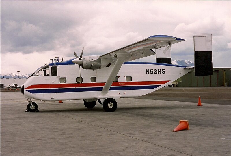 Propeller Airplane — White, Overcast
