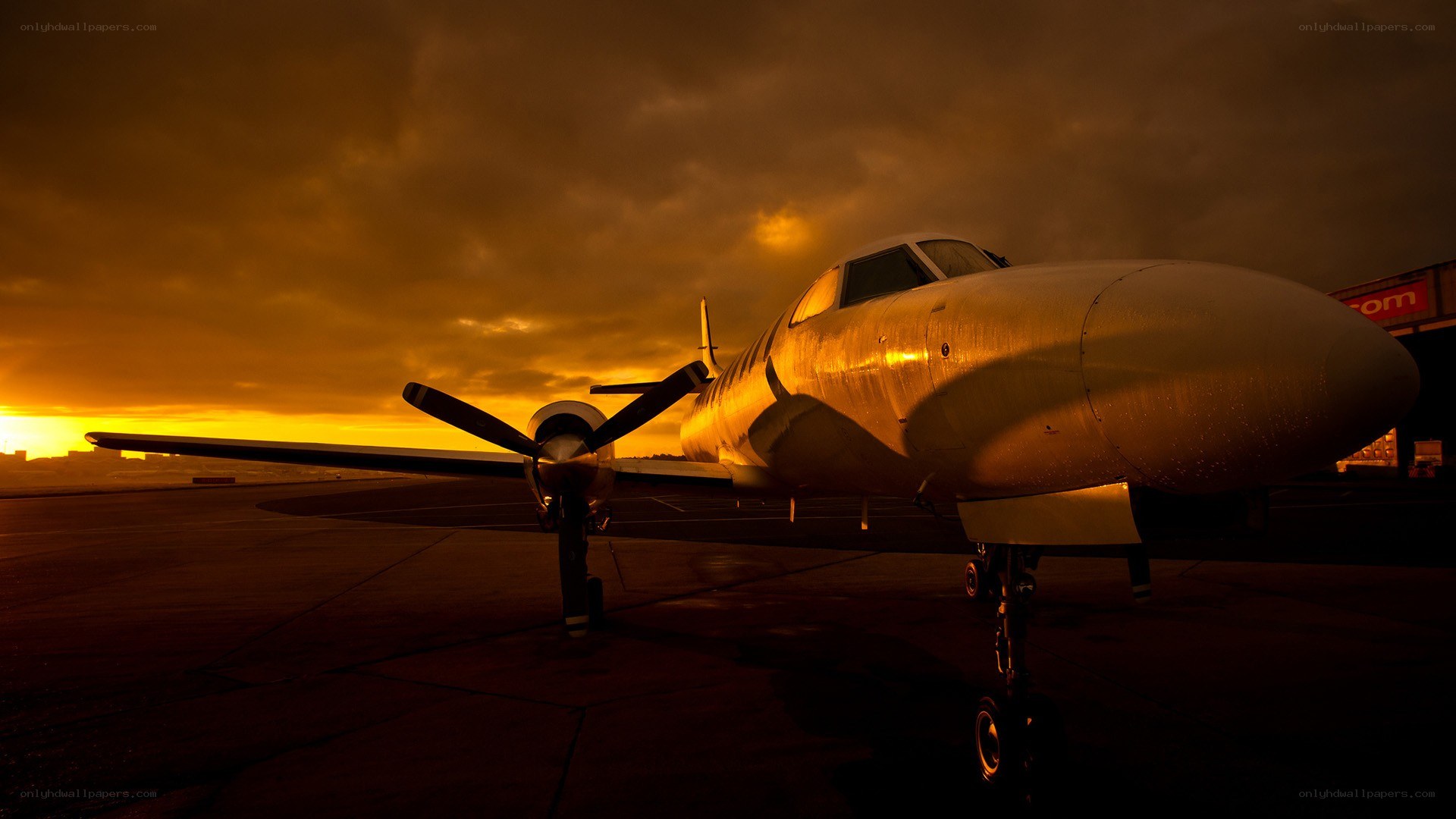 Propeller plane at sunset