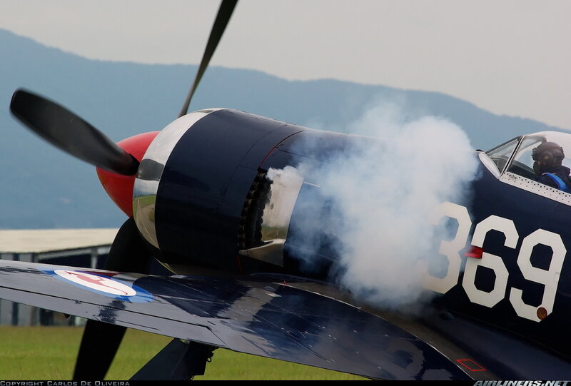 Propeller Plane Emitting Smoke