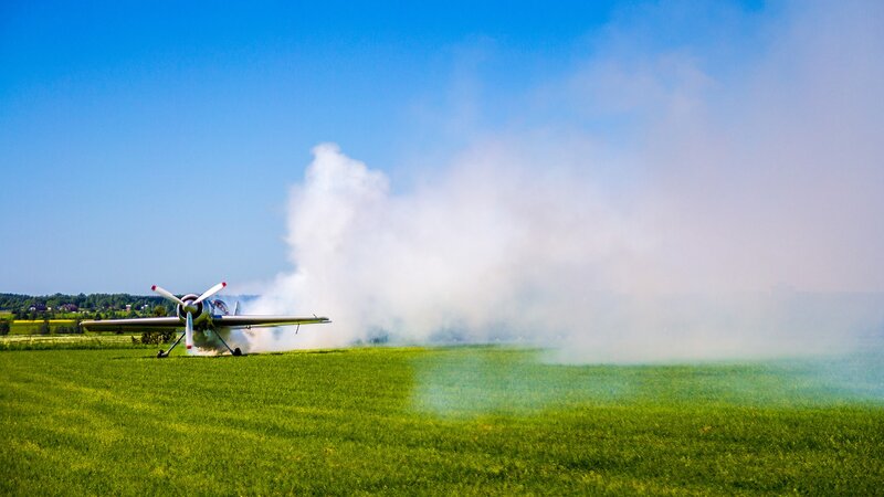 Propeller Plane on Field