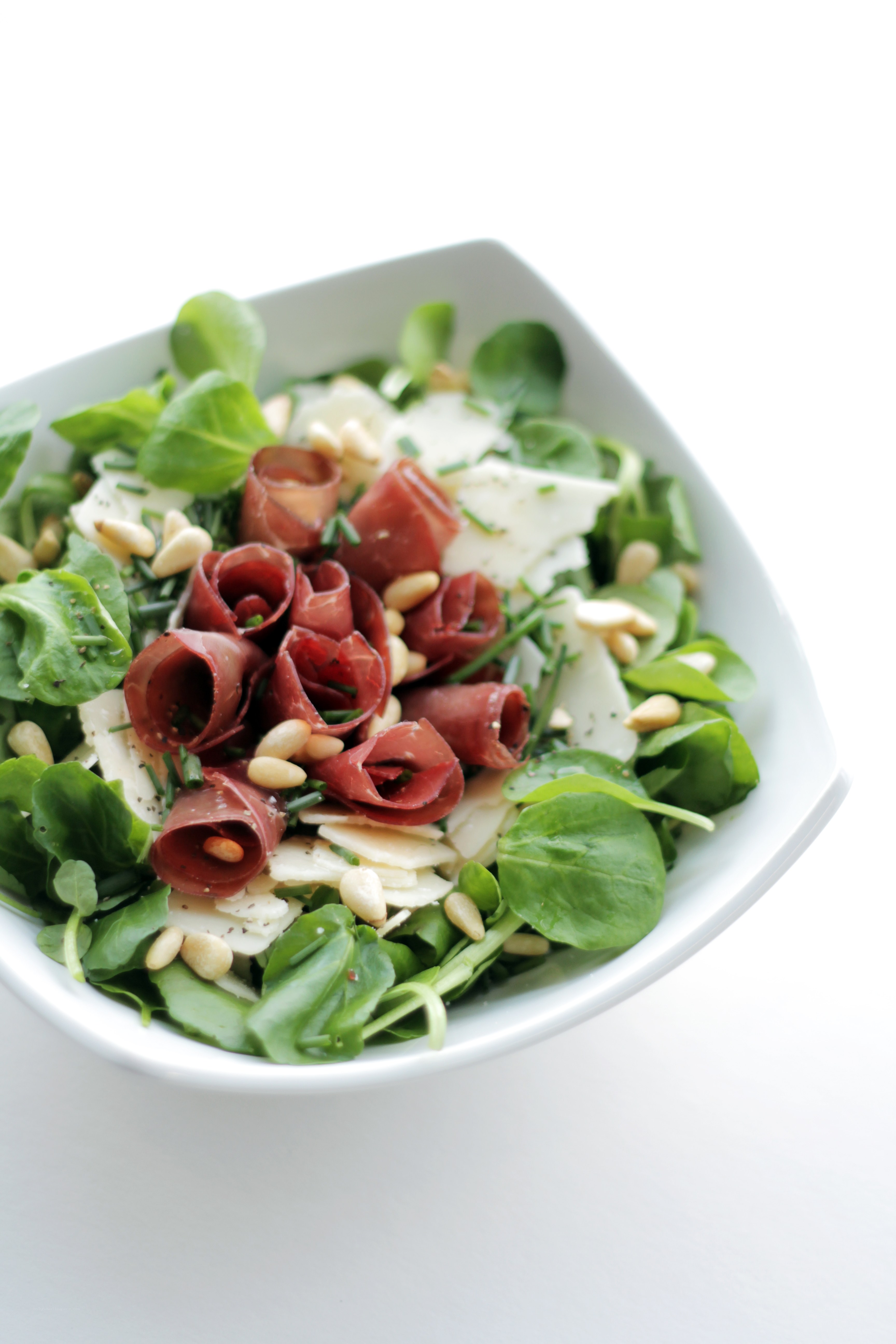 Prosciutto and pine nut salad