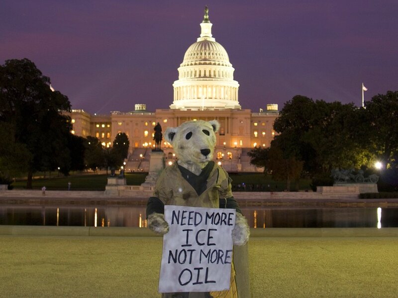 Protest sign in front of Capitol