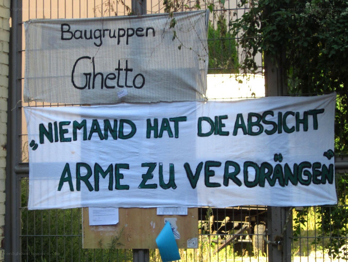 Protest signs on a fence