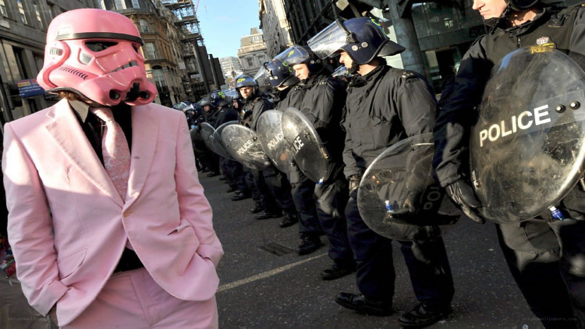 Protester in pink stormtrooper suit