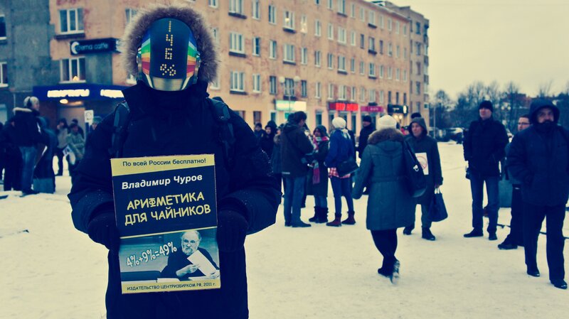 Protester with book sign