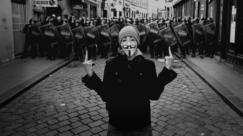 Protester with Guy Fawkes mask