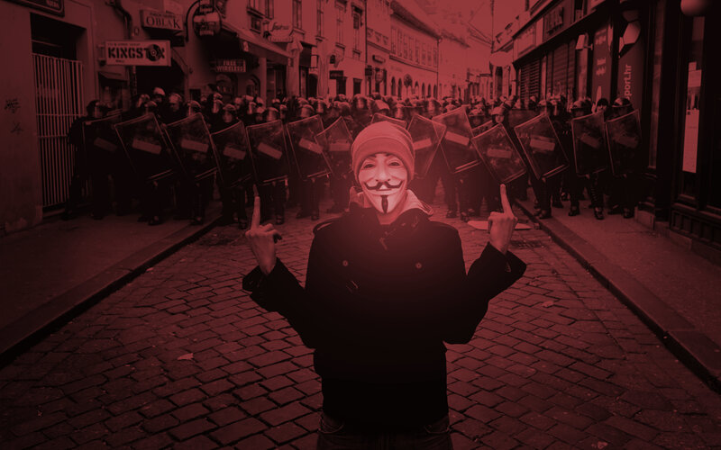 Protester with Guy Fawkes mask