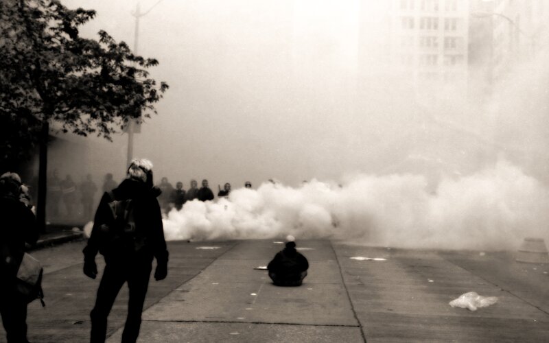 Protesters amid tear gas