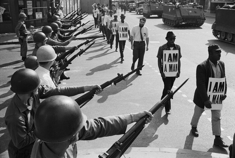 Protesters face National Guard