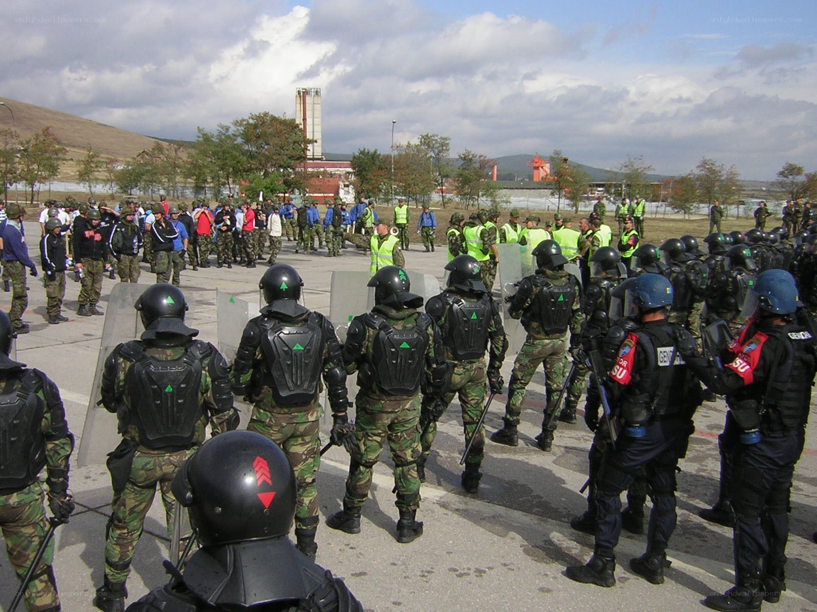 Protesters facing riot police